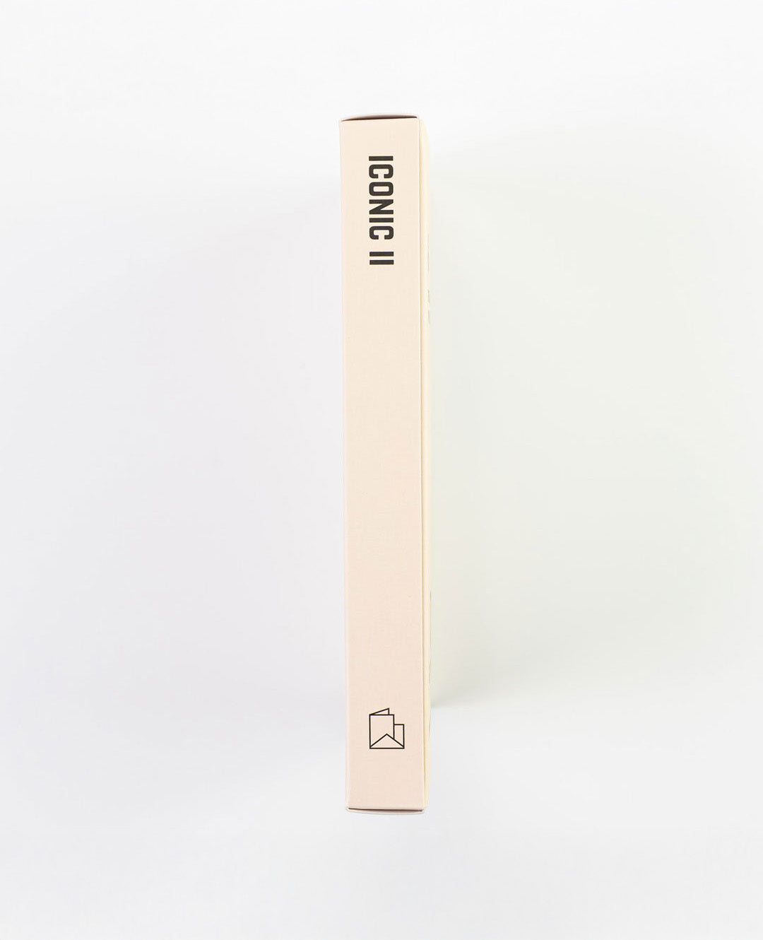 Beige cylindrical product with 'Iconic II' branding on a white background