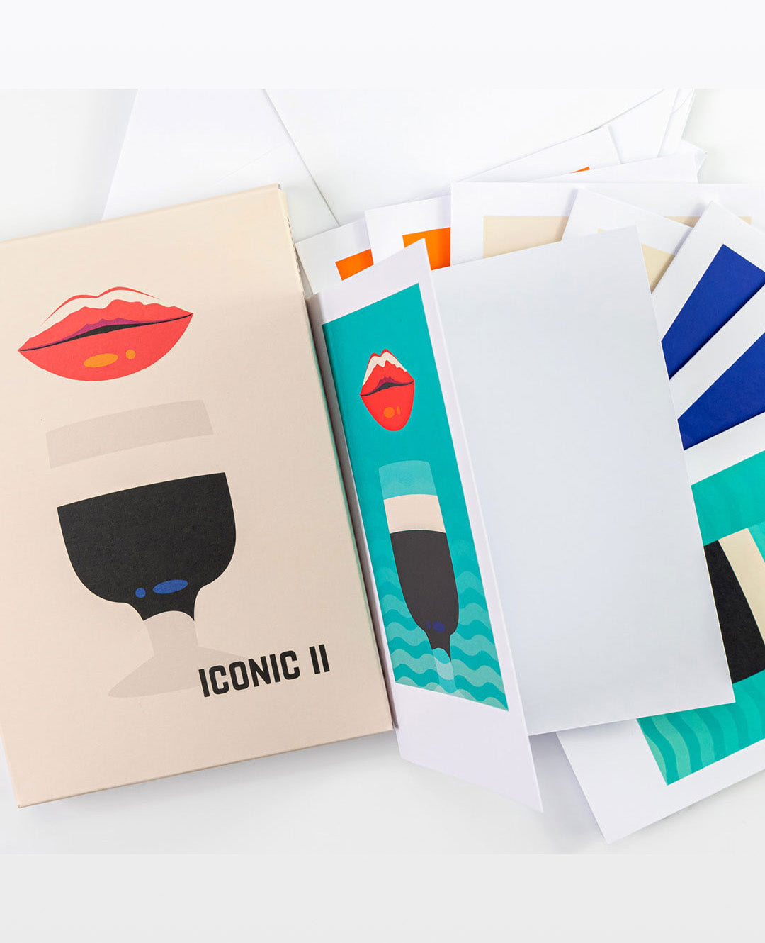 Packaging with lip and wine glass illustrations and 'Iconic II' text on a white background