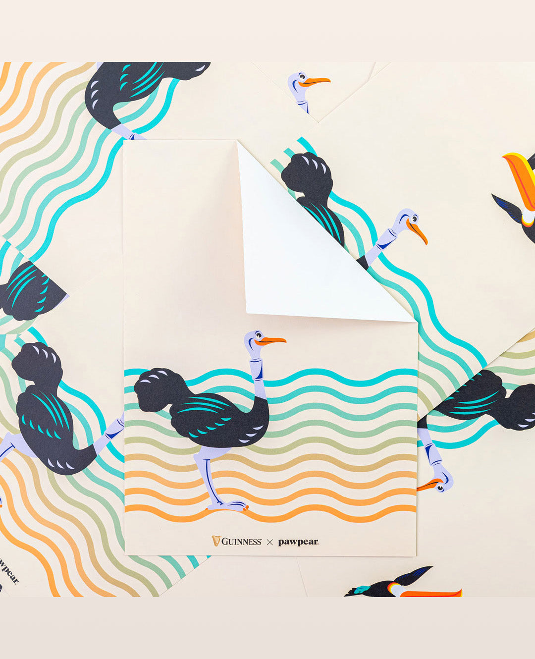 Product packaging with pelican design and colorful wavy patterns on a beige background