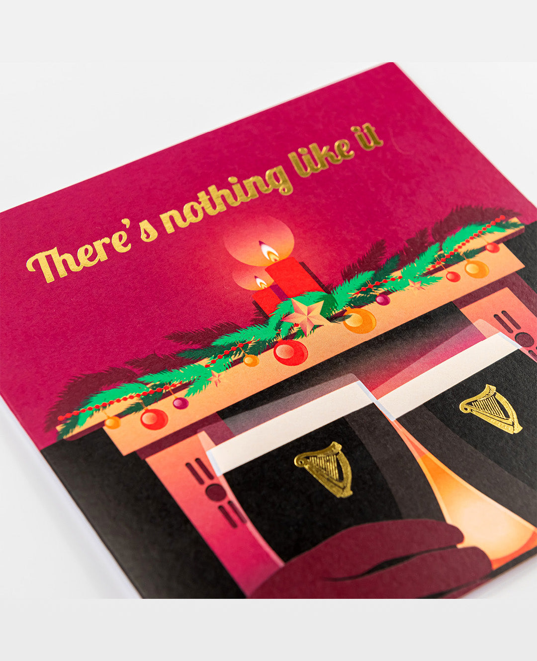 Product packaging with a red background, gold text, and festive design elements.