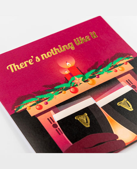 Product packaging with a red background, gold text, and festive design elements.