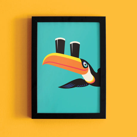 Framed artwork of a toucan on a yellow background