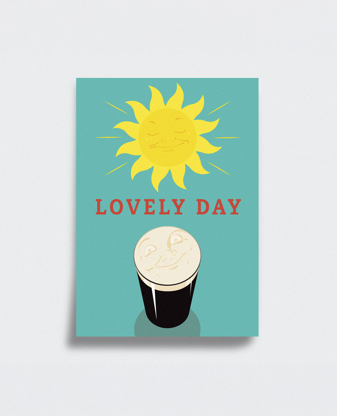 Framed artwork with a sun and Guinness illustration on a red background