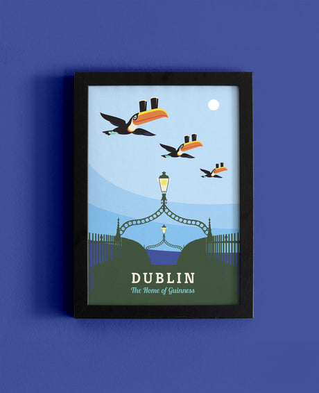 Framed artwork with birds and a lamp post on a blue background, featuring the text 'Dublin The Home of Guinness'.