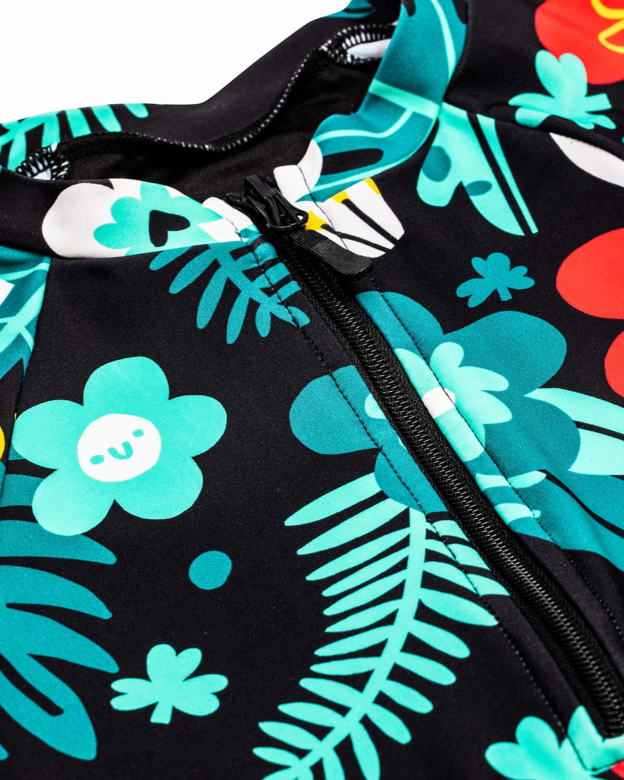 Detail image of the Guinness x Fatti Burke Hawaiian Style Swimming suit cheast 1/4 zip