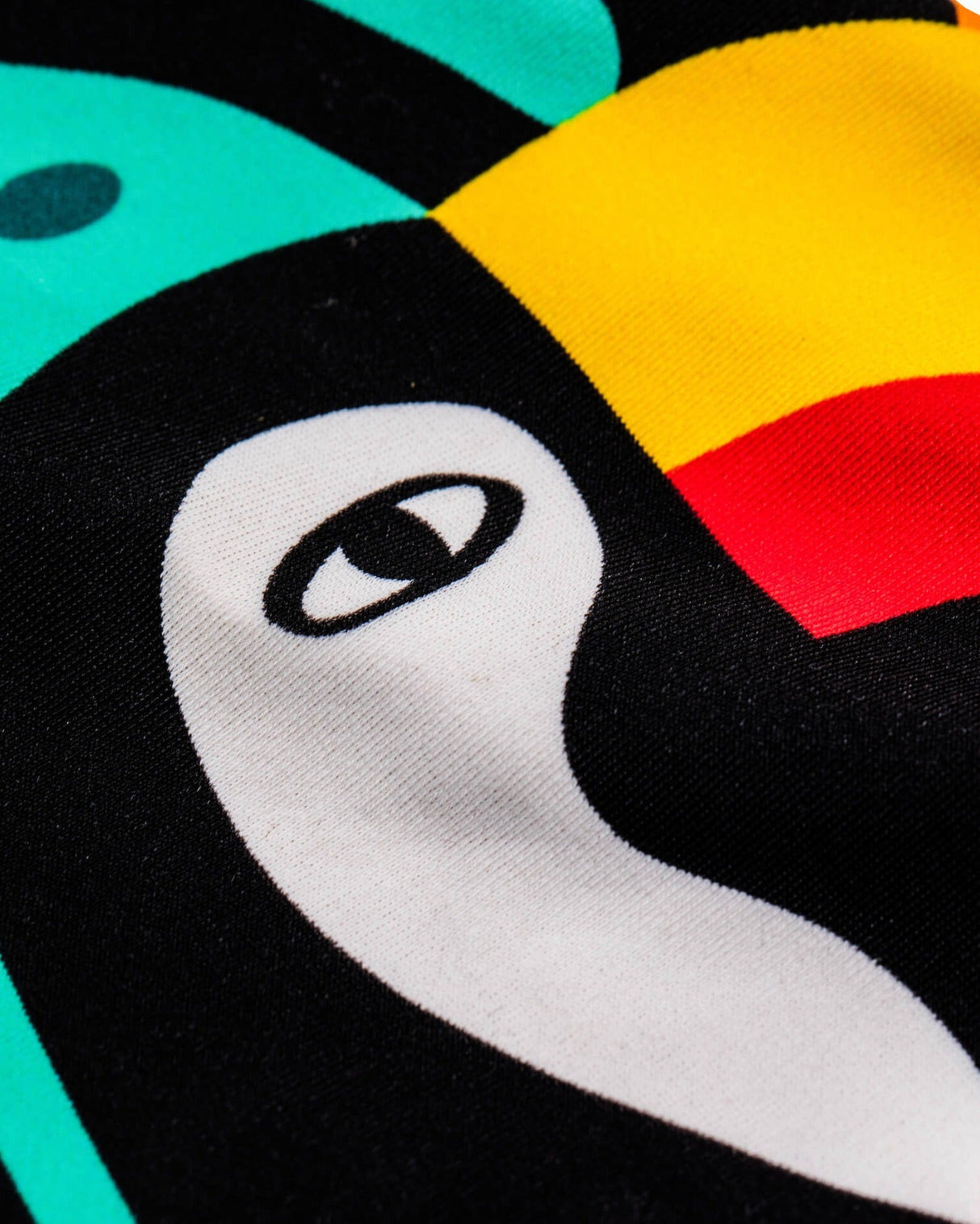 Detail image of the Guinness x Fatti Burke Hawaiian Style Swimming suit Toucan design