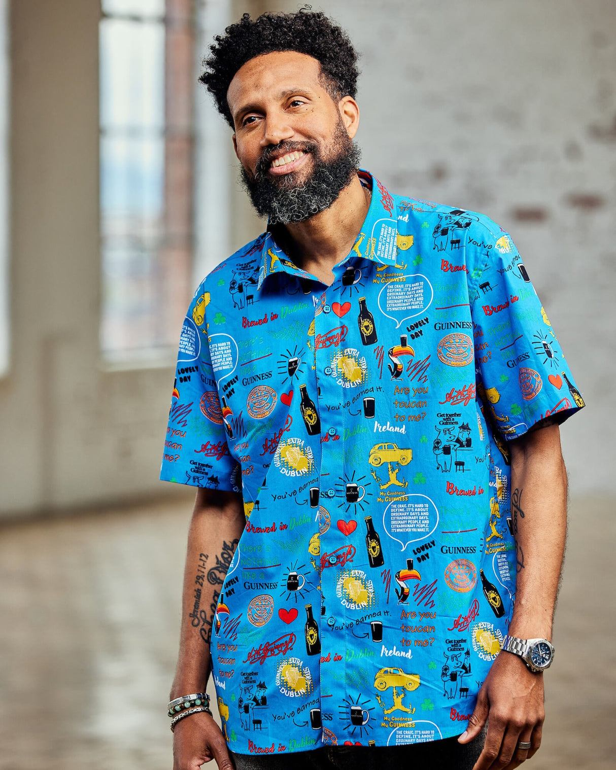 Man wearing the Guinness Storehouse Blue Shirt.