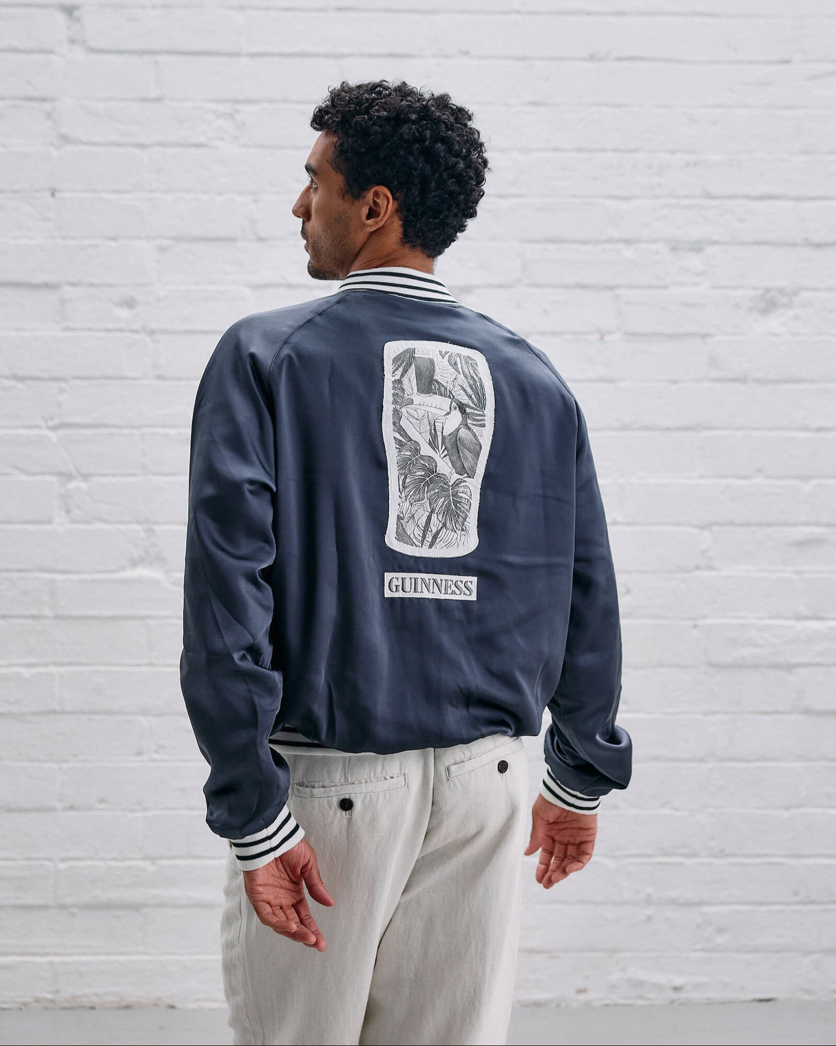 Guinness Hand Drawn Toucan Grey Varsity Jacket