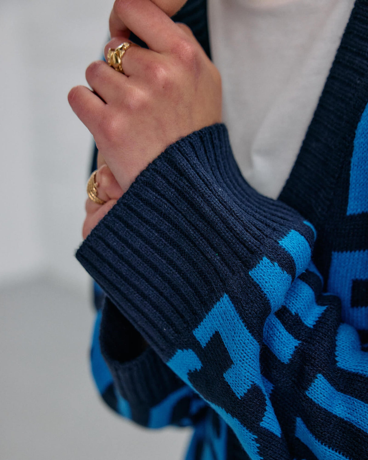 Close up image of the lovely day blue cardigan's sleeve, from the exclusive clothing collection in the Guinness Storehouse, Dublin, Ireland.