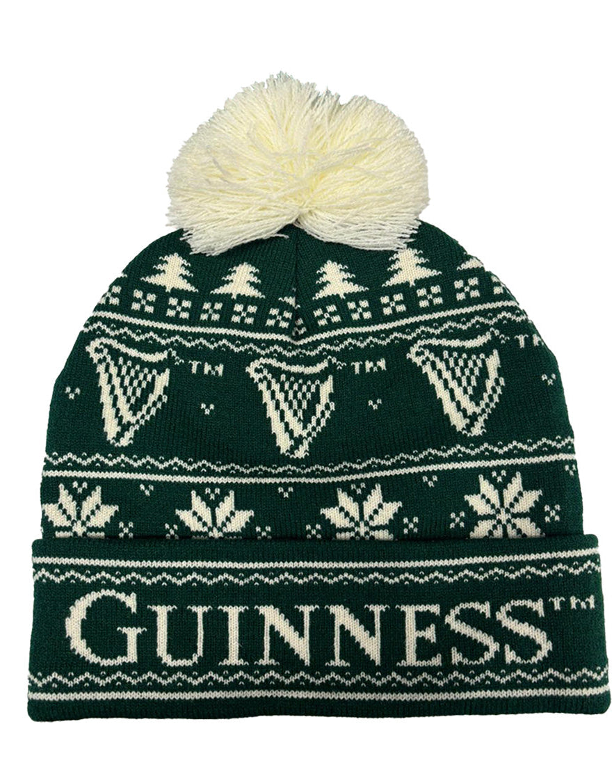 Green knit beanie with white patterns and pom-pom, featuring the Guinness logo on a white background.