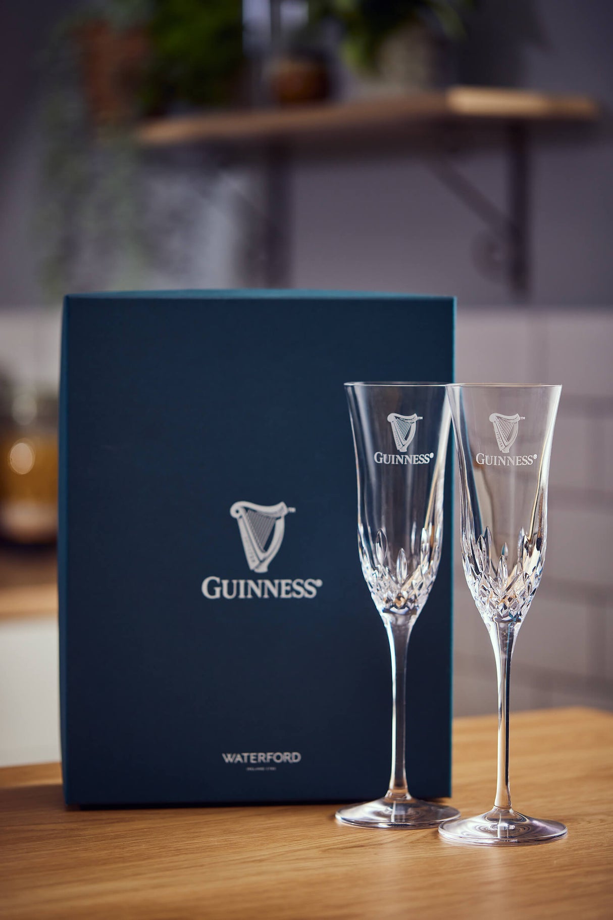 A set of 2 Champagne flute glasses made by Waterford Crystal in collaboration with the Guinness Storehouse in Ireland.