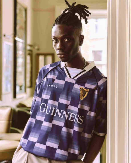 Image of man wearing a Guinness x Art of Football jersey