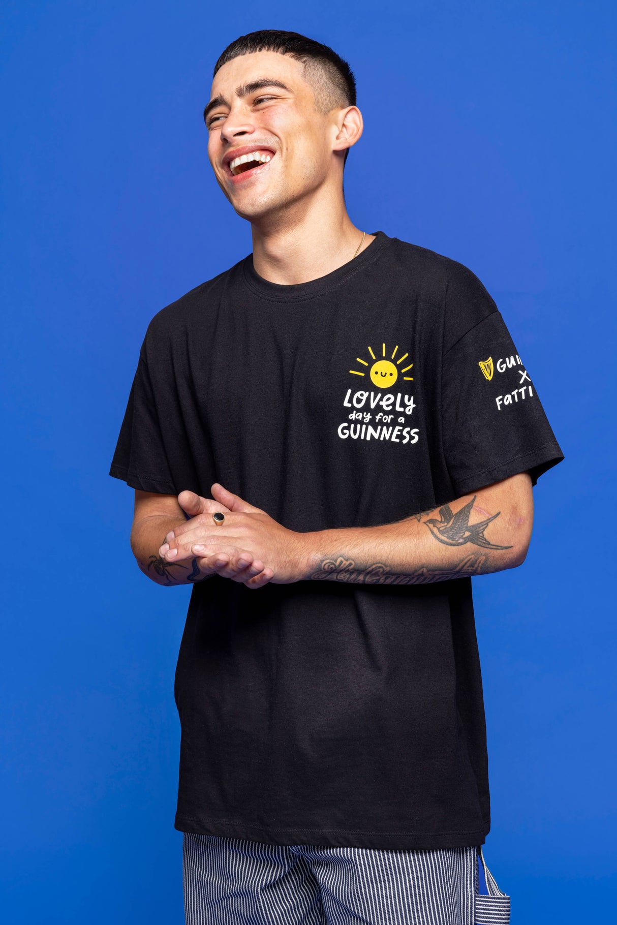 Model wearing the Guinness X Fatti Burke Lovely Day for a Guinness capsule collection.