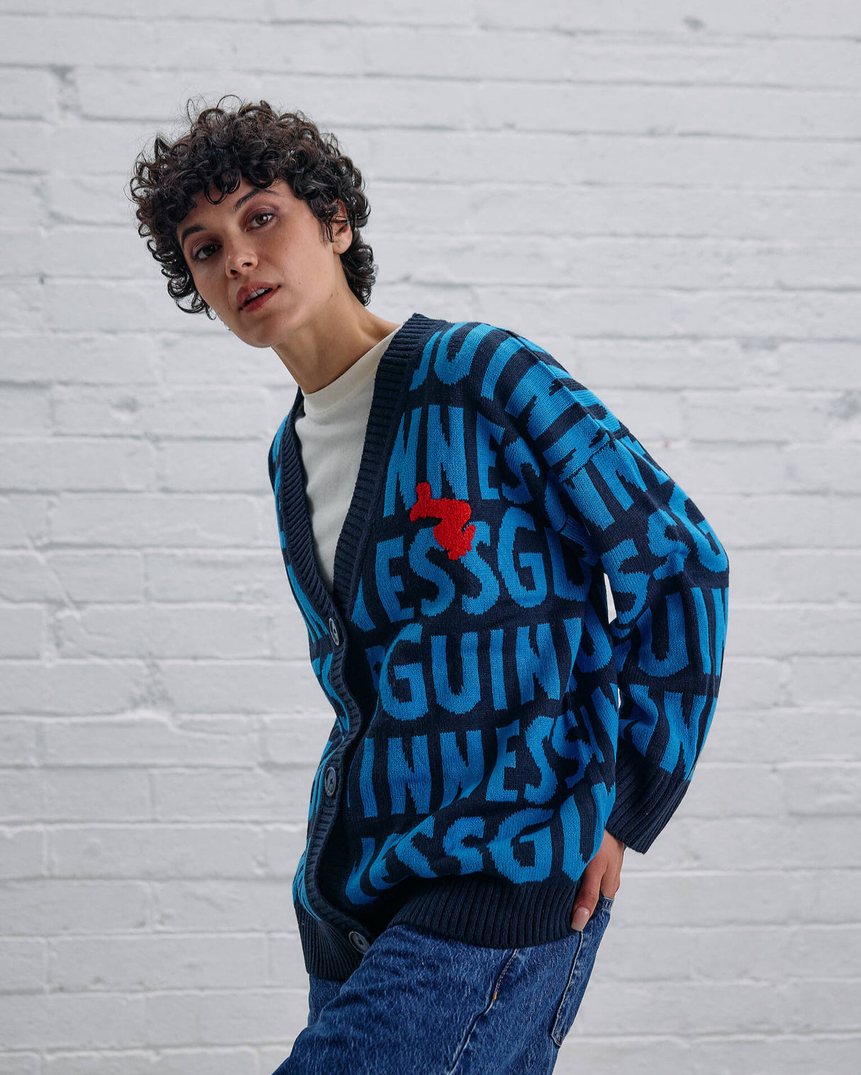 Model wearing the lovely day blue cardigan from the exclusive clothing collection in the Guinness Storehouse, Dublin, Ireland.