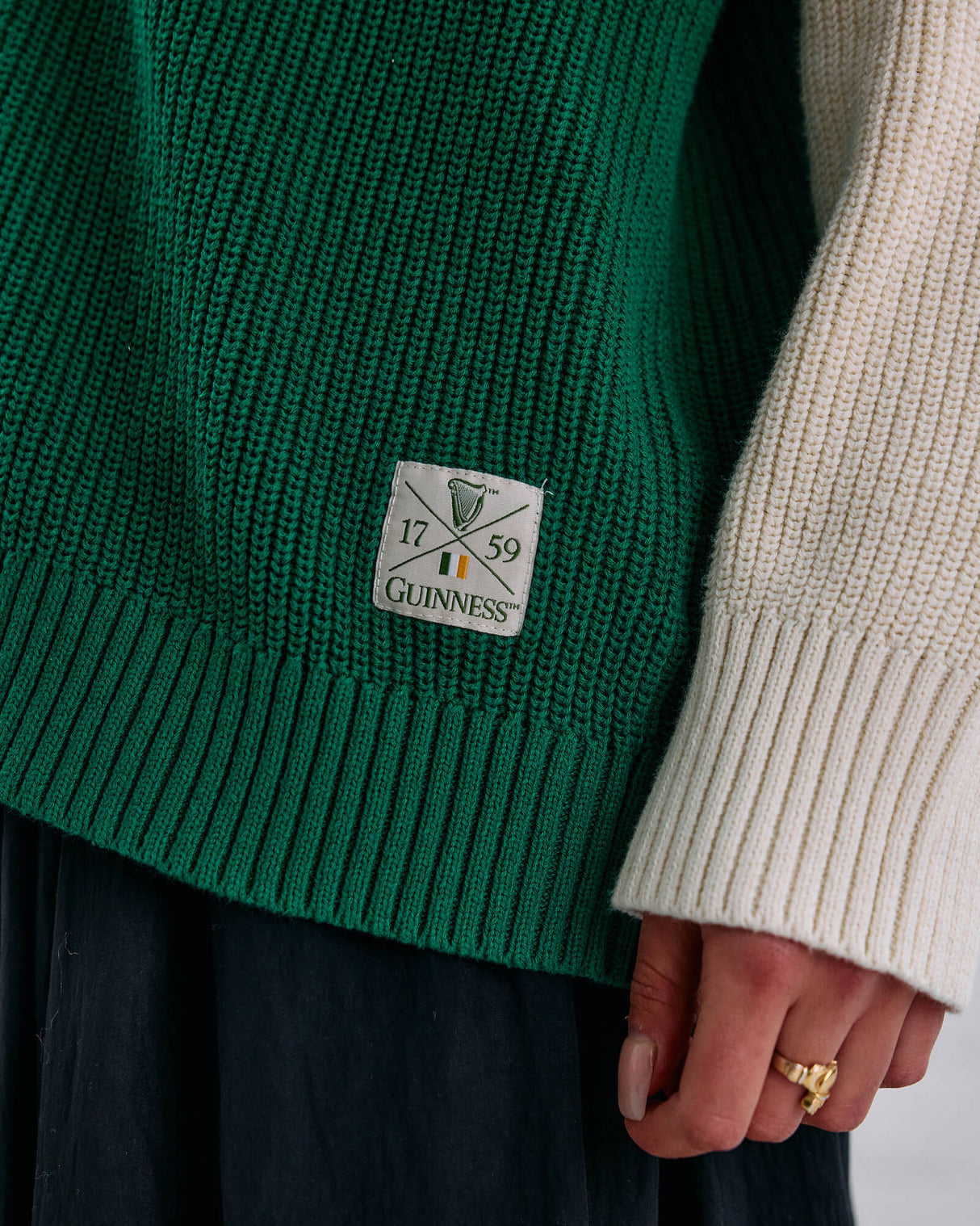Close up image of the Guinness Ireland Green Cardigan label.