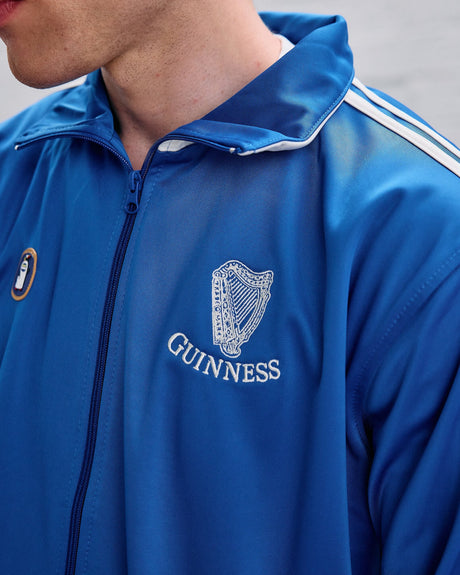 Model wearing the Guinness Penguin Blue Zip Jacket.