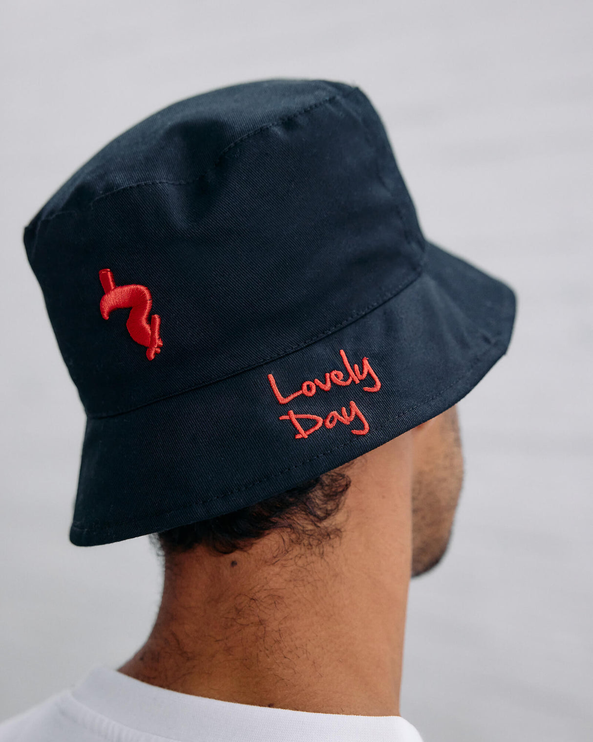 Model wearing the lovely day black bucket hat.