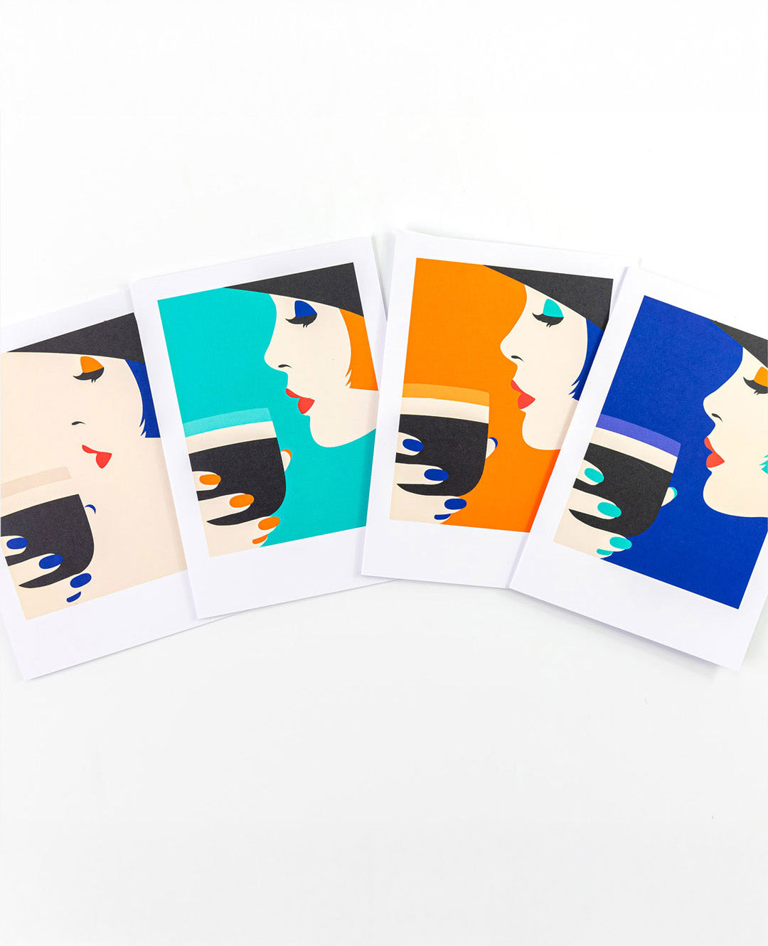 Four colorful greeting cards with stylized faces and coffee cups on a white background