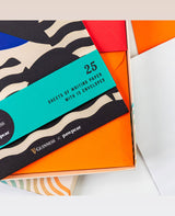 Packaging of writing paper with envelopes featuring Guinness branding.