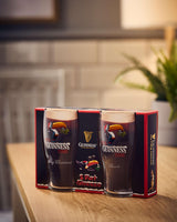 Pack of Guinness pints on a kitchen counter with a blurred background