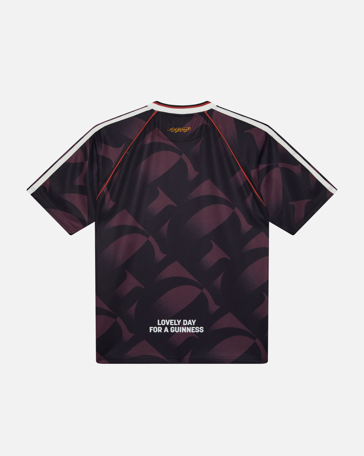 Black t-shirt with geometric pattern and 'Lovely Day for a Guinness' text on a white background