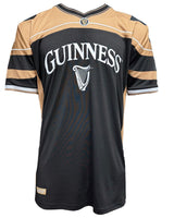 Black and tan jersey with Guinness logo on a white background