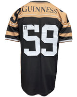 Black and gold sports jersey with 'Guinness' branding on a white background