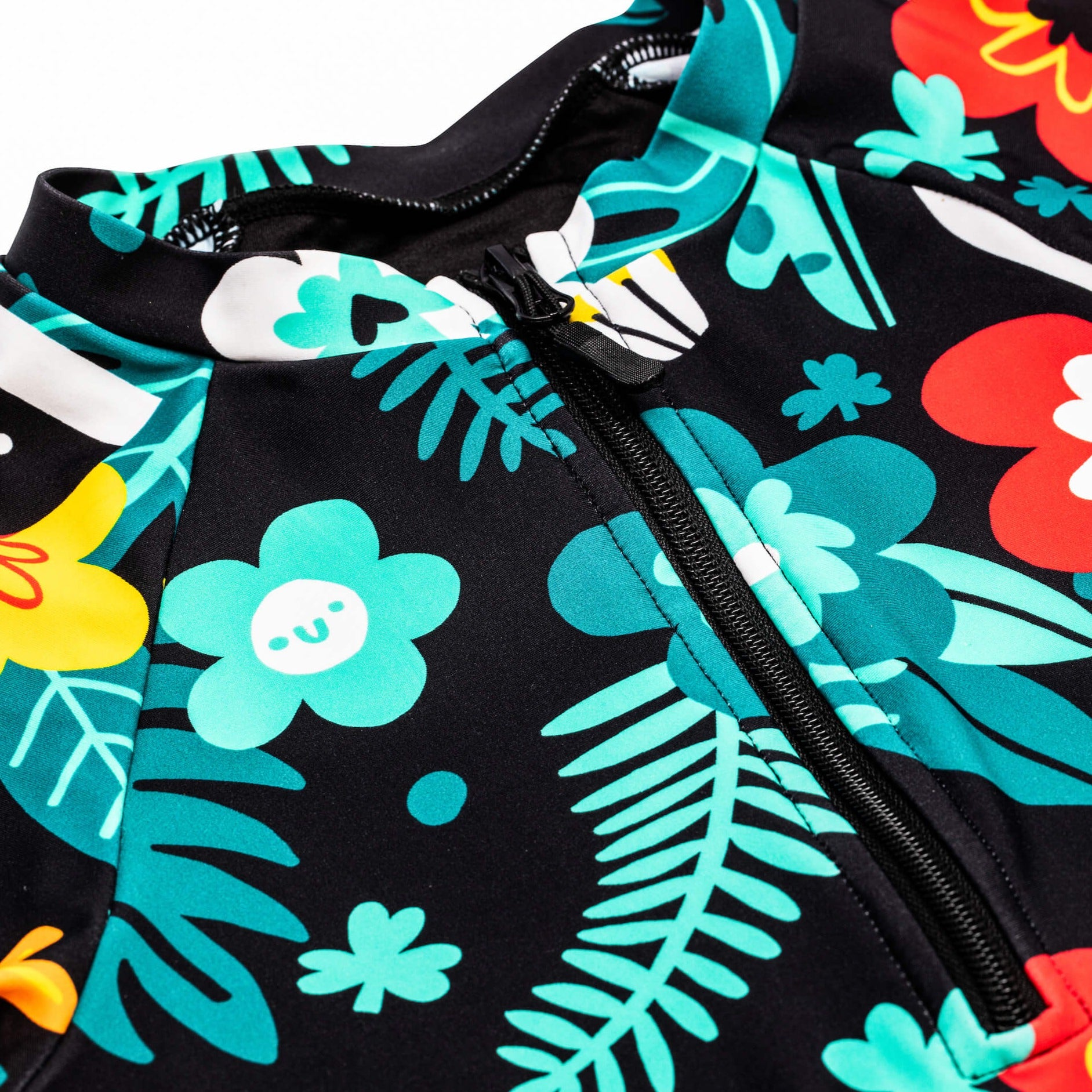 Detail image of the Guinness x Fatti Burke Hawaiian Style Swimming suit cheast 1/4 zip