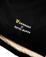 Guinness Storehouse and Kathi Burke Lovely Day logo on the changing robe.