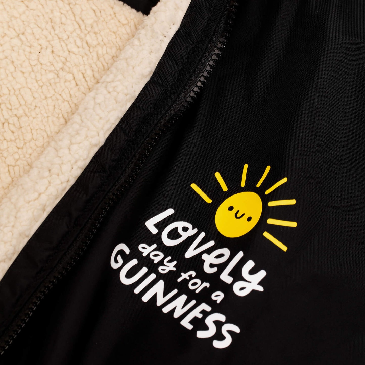 Guinness Storehouse and Kathi Burke cheast Lovely Day logo on the Dry Robe.