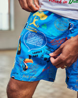 Man wearing the Guinness Storehouse Exclusive blue swim shorts