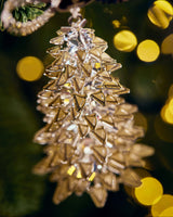 Decorative Christmas tree ornament with a blurred festive background