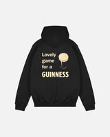 Black hoodie with 'Lovely game for a GUINNESS' text and logo on the back against a light gray background