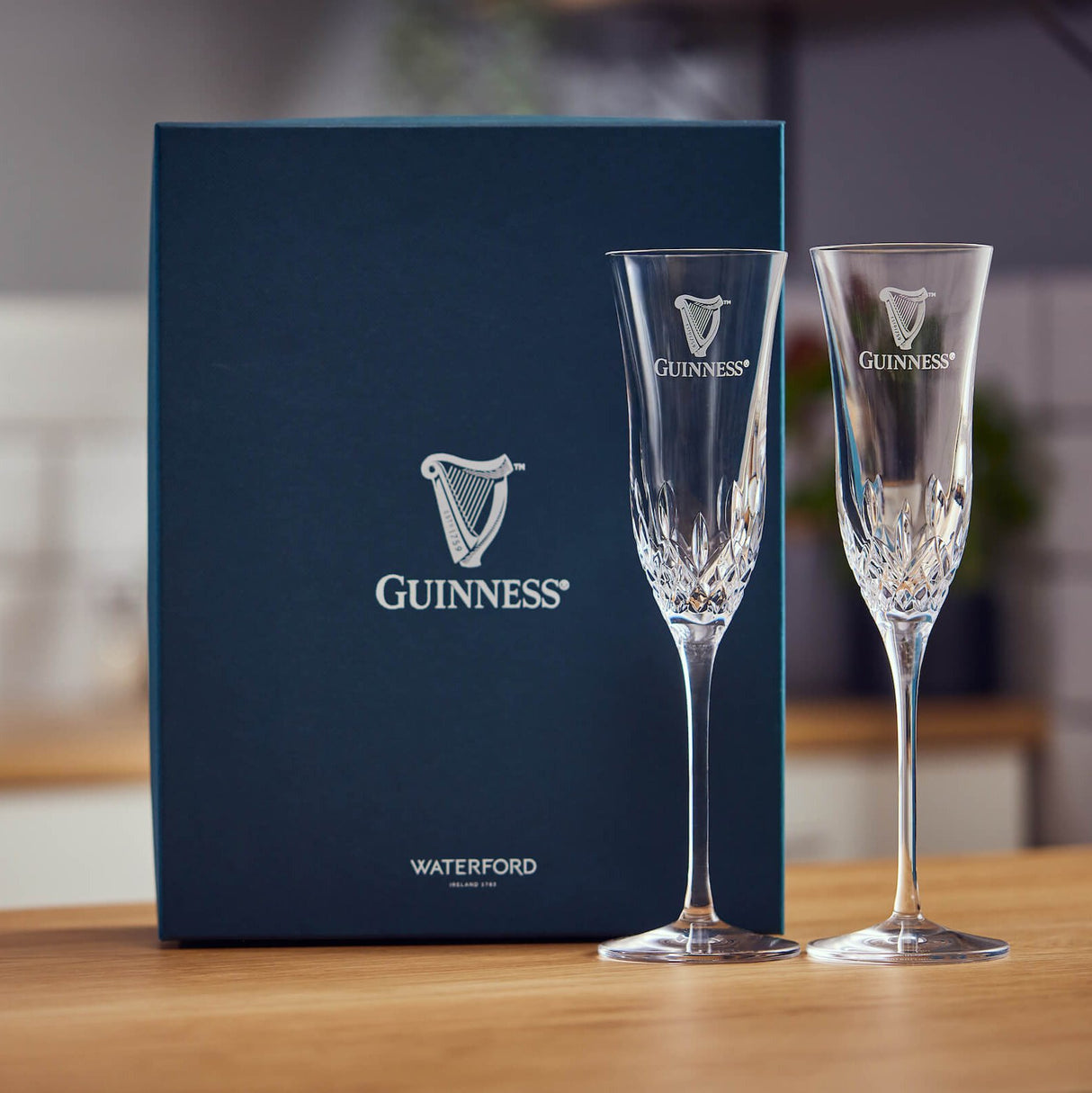 A set of 2 Champagne flute glasses made by Waterford Crystal in collaboration with the Guinness Storehouse in Ireland.