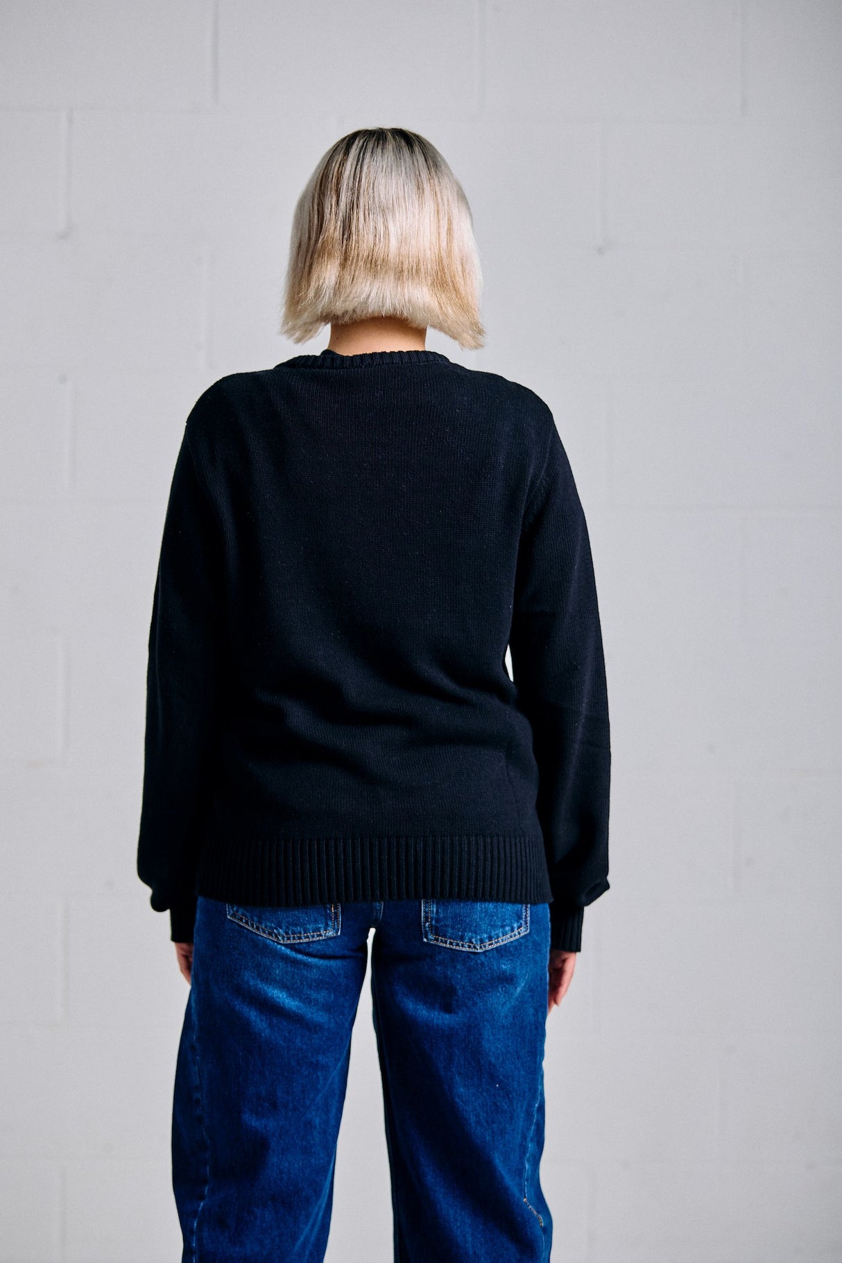 Black Christmas Smiling Pint Sweater