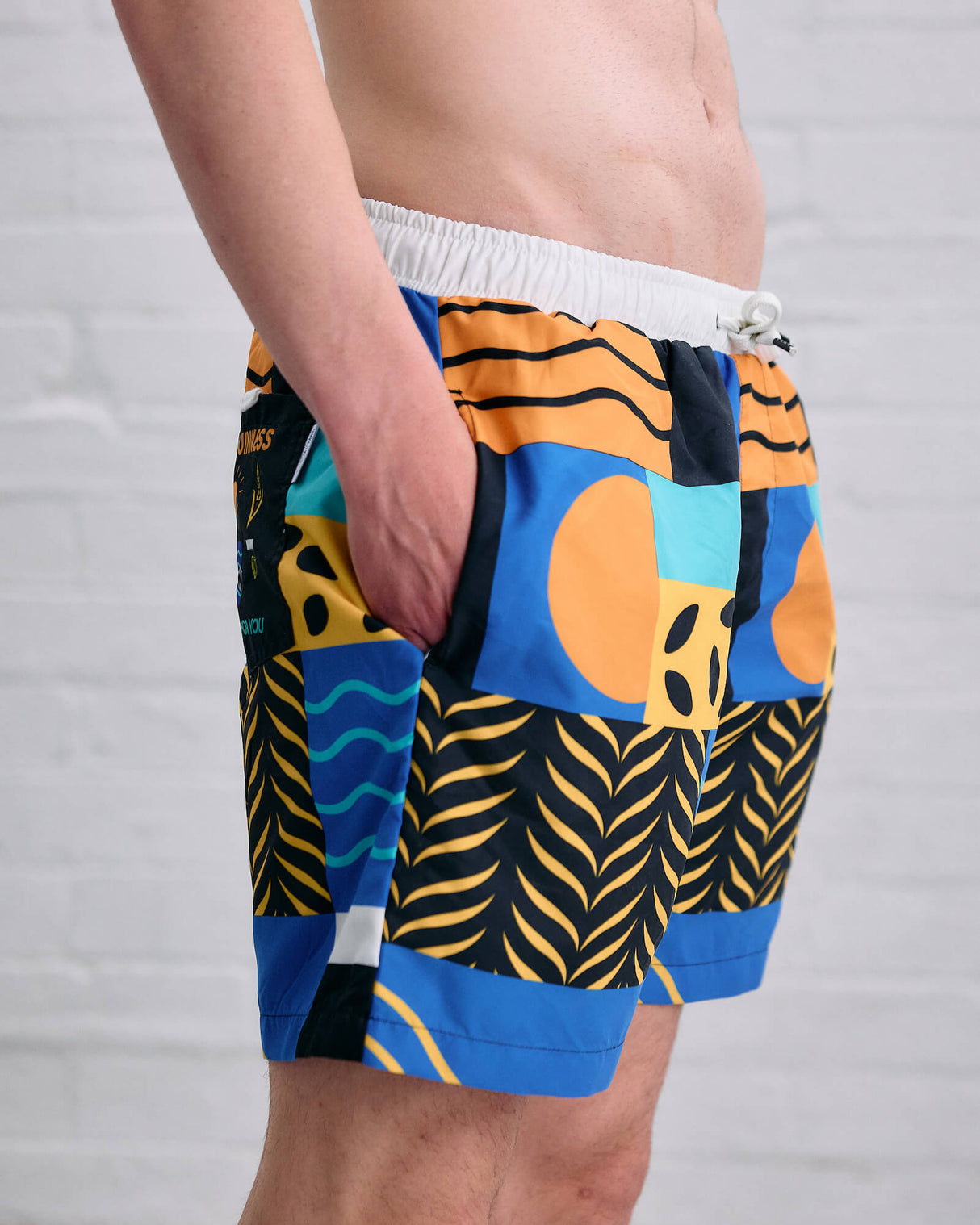 Model wearing the Guinness Element Swim Short.