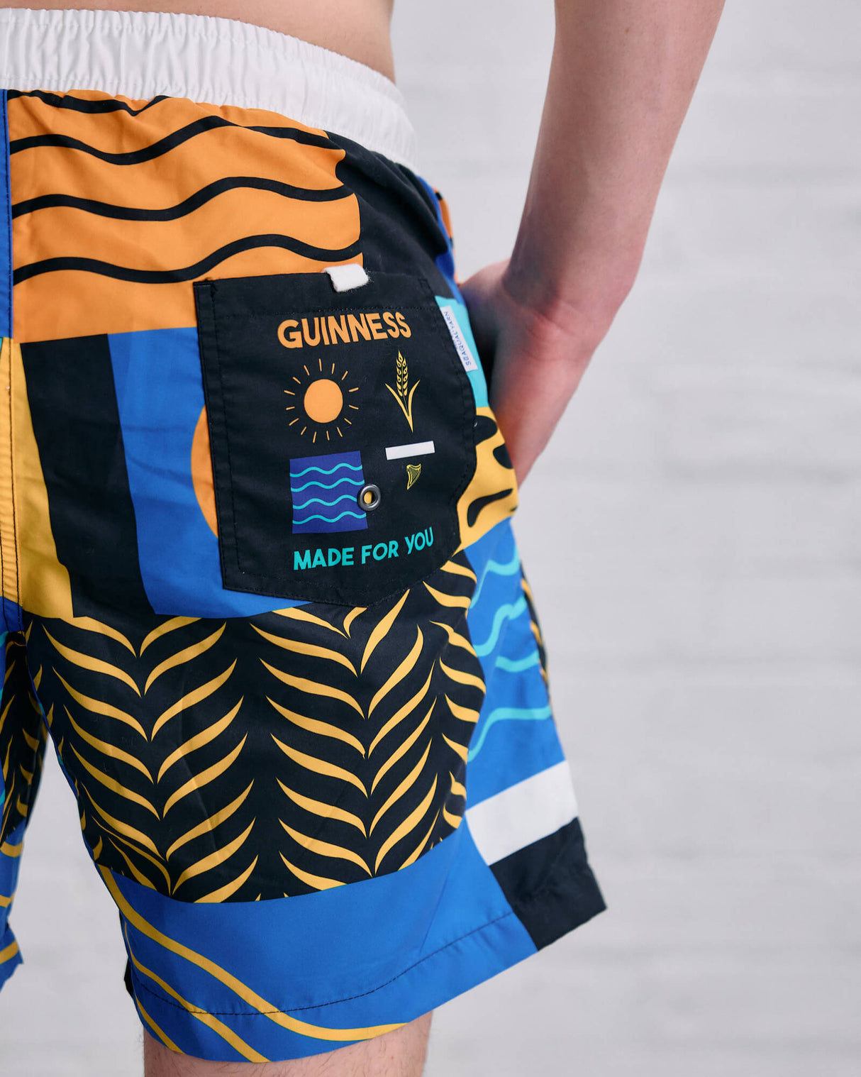Model wearing the Guinness Element Swim Short.