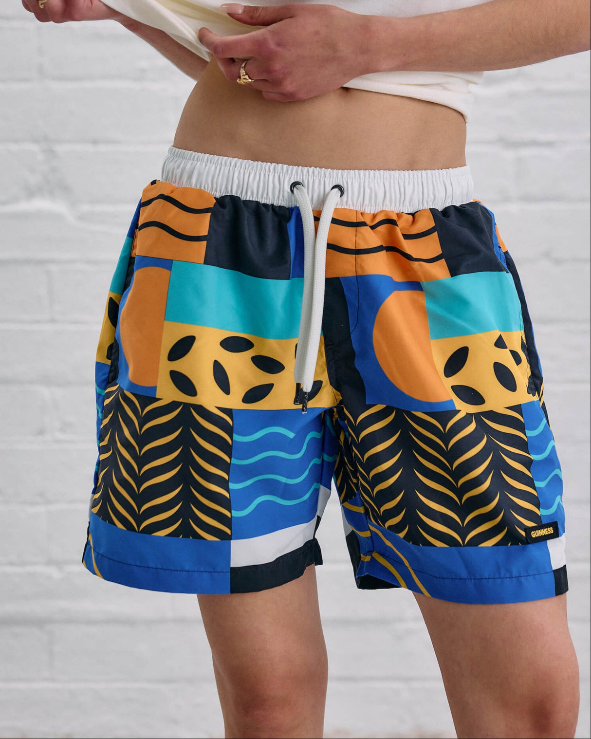Model wearing the Guinness Element Swim Short.