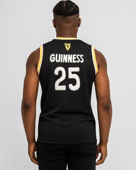 Person wearing a black sports jersey with 'Guinness' and number '25' on the back, against a white background.