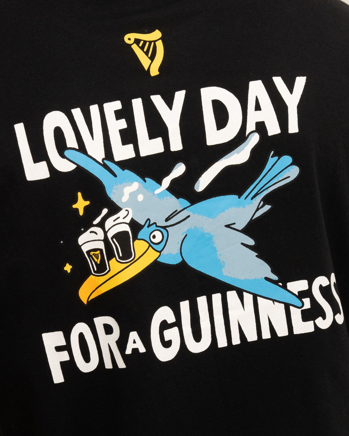 Black shirt with 'Lovely Day for a Guinness' text and graphic on the back
