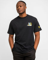 Man wearing a black t-shirt with a logo on a white background