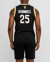 Person wearing a black sports jersey with 'Guinness' and number '25' on the back, against a white background.