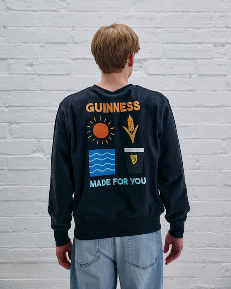 Model wearing the Guinness Naturally Sweater.