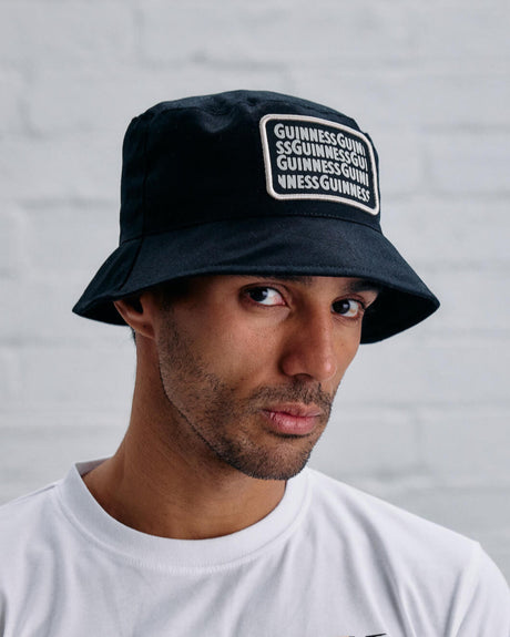Model wearing the lovely day black bucket hat.
