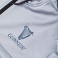 Detail of the Guinness Storehouse Exclusive grey performance jacket logo.