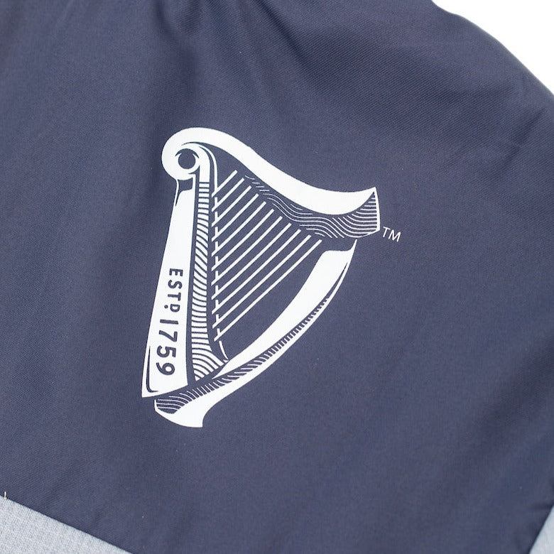 Detail of the Guinness Storehouse Exclusive grey performance jacket logo at the back.