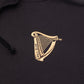 Detail of the Guinness Storehouse Exclusive black hoodie iconic Guinness Harp logo.