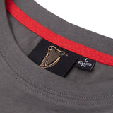 Red collar trim of the Guinness Storehouse Exclusive dark grey t-shirt.