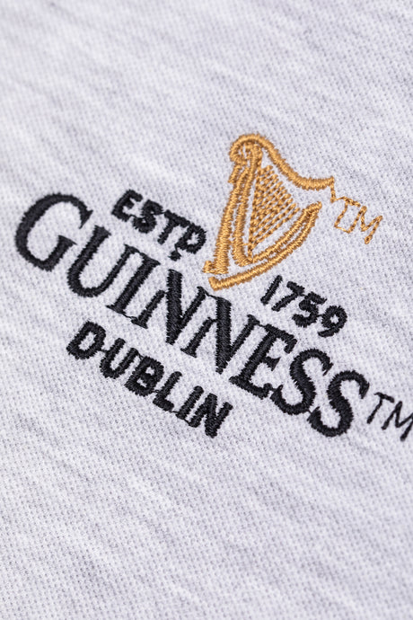 Detail of the Guinness Storehouse Exclusive grey  polo's logo.