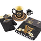 Guinness Storehouse Kitchen gift set with oven gloves, kitchen apron, 2 mugs and hot plate.